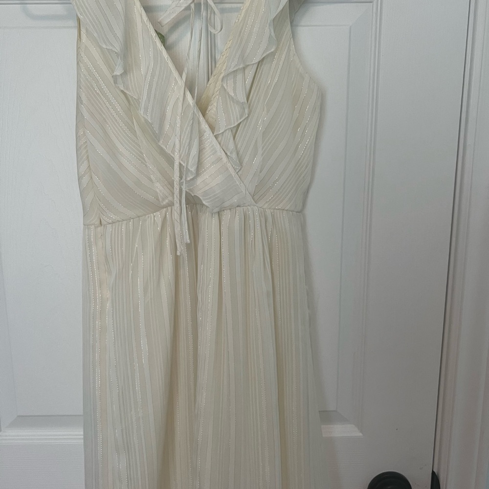Beautiful white dress with light silver pinstripes.